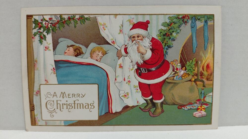 Christmas postcard Santa Claus children sleeping embossed Unposted Divided